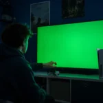 Joueur face à un écran vert provoqué par sa console avant son extinction.