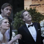 Justine, Michael, John et Claire pendant le mariage dans Melancholia