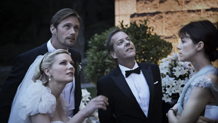 Justine, Michael, John et Claire pendant le mariage dans Melancholia