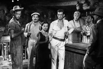 Les personnages du Salaire de la peur réunis au bar, dans le film de Clouzot de 1953